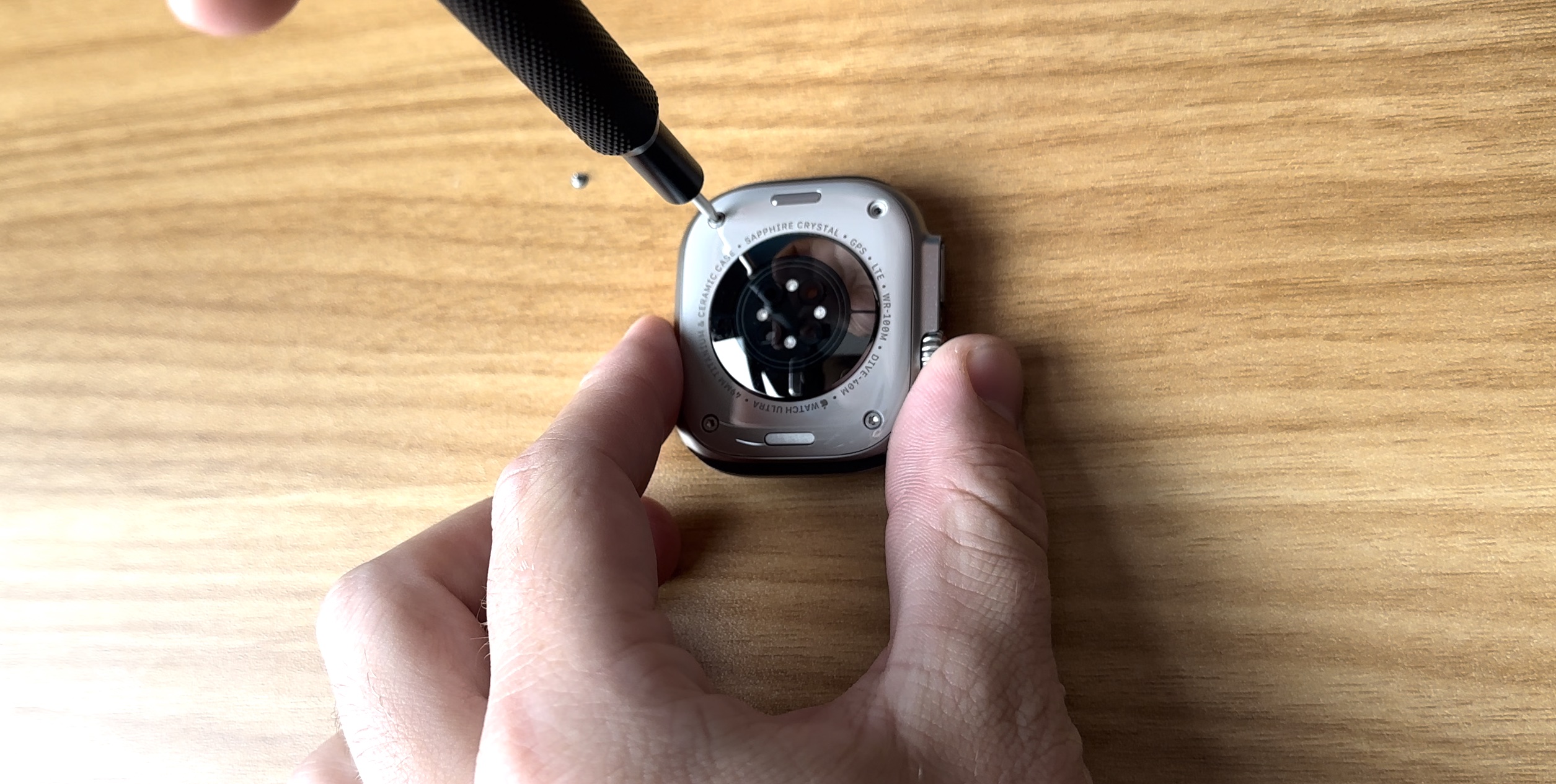 Unscrewing-Apple-Watch-Ultra.jpg