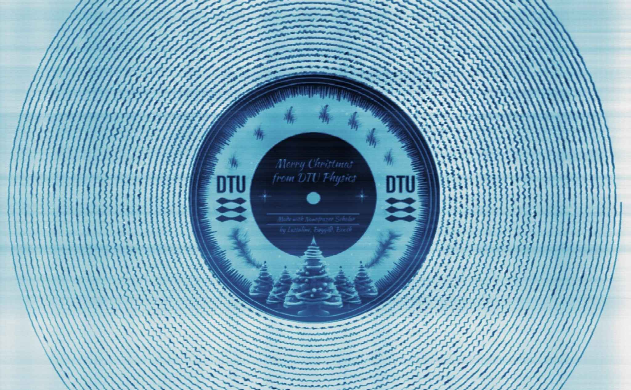 Chiếc đĩa "vinyl" đường kính chỉ 40 µm chứa 25 giây bài hát Rocking Around the Christmas Tree