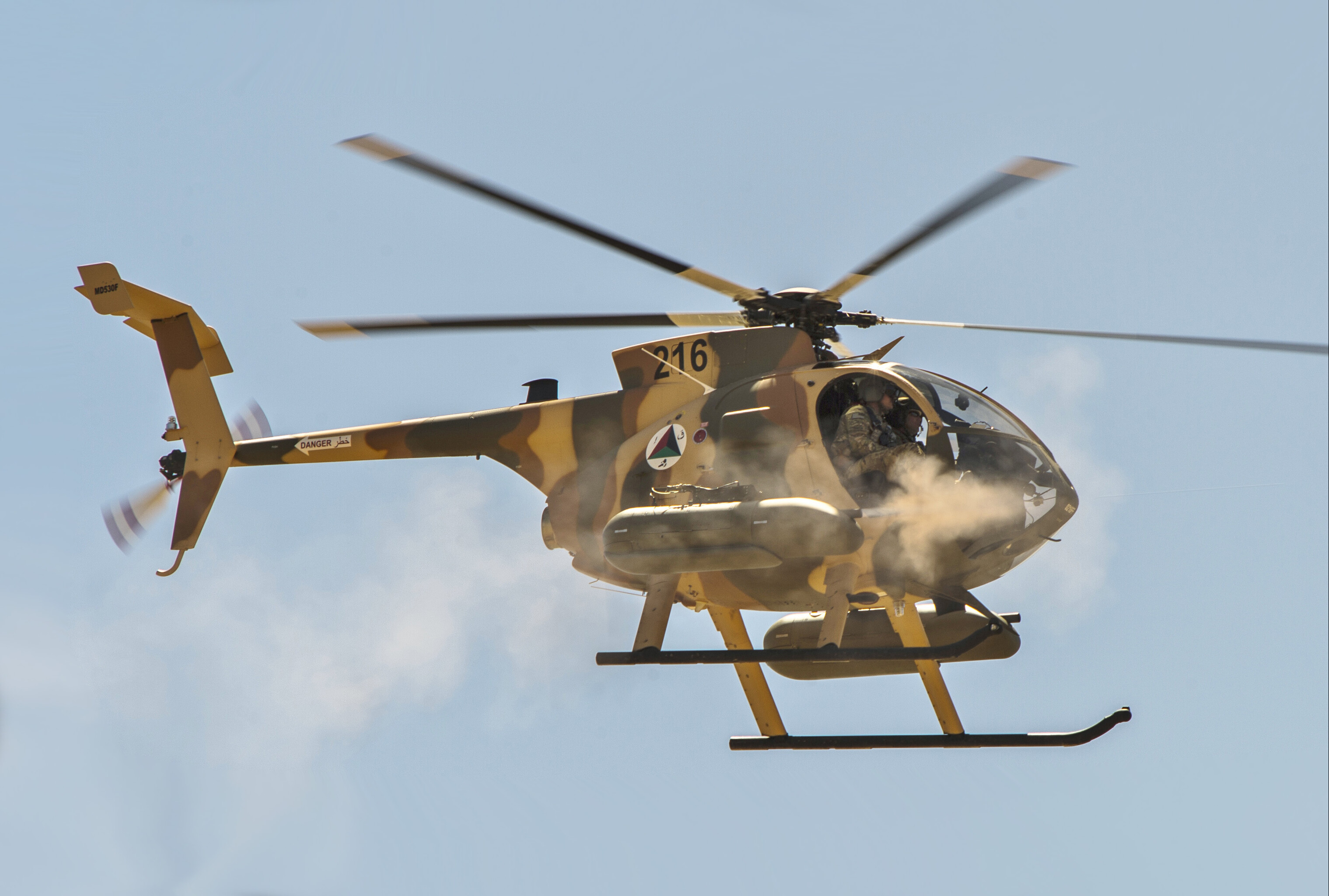 Afghan_Air_Force_MD-530F_helicopter_fires_machine_guns.jpg