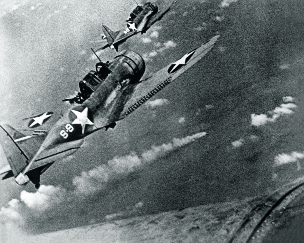 SBD-3-Dauntless-bombers-of-VS-8-over-the-burning-Japanese-cruiser-Mikuma-on-6-June-1942.jpg